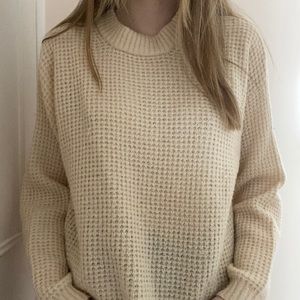 Cream coloured knit sweater